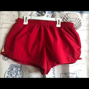 Red running Nike shorts size large